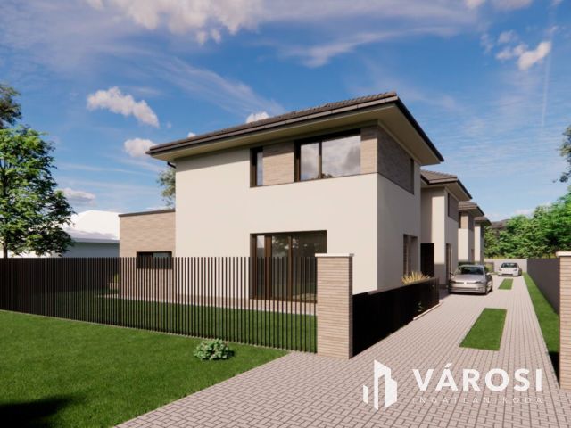 Debrecen kedvelt, csendes kertvárosi részén ELADÓ IKERHÁZ