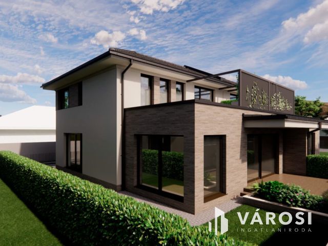 Debrecen kedvelt, csendes kertvárosi részén ELADÓ IKERHÁZ